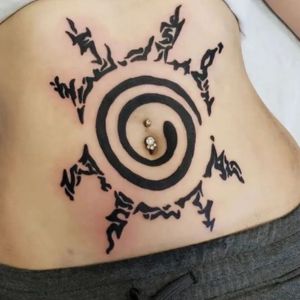 female naruto seal tattoo