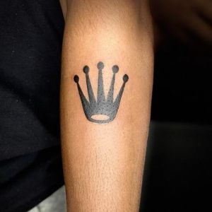 simple Rolex tattoo for men